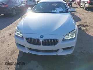 2015 BMW 6 Series 640i xDrive with VIN WBA6B8C50FD453317, listed as a IAAI auction lot 41635430 with 77,811 mi miles and . Bid and sale history available at DreamBid. Image 12.
