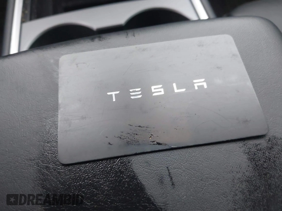 2022 Tesla Model Y Performance with VIN 7SAYGDEF1NF379167, listed as a IAAI auction lot 41429842 with 86,582 mi miles and . Bid and sale history available at DreamBid. Image 11.