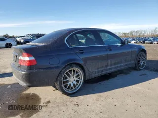 2002 BMW 3 Series 330xi with VIN WBAEW53412PG09026, listed as a Copart auction lot 89108295 with 106,516 mi miles and Salvage title. Bid and sale history available at DreamBid. Image 3.