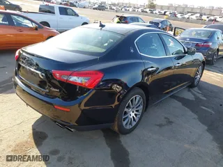 2014 Maserati Ghibli S Q4 with VIN ZAM57RTA2E1086046, listed as a IAAI auction lot 41846389 with 55,984 mi miles. Bid and sale history available at carsss.com. Image 4.