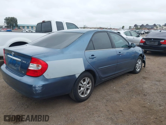 2004 Toyota Camry LE with VIN 4T1BF32K54U572537, listed as a IAAI auction lot 41850322 with 167,076 mi miles and . Bid and sale history available at DreamBid. Image 4.
