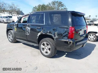2018 Chevrolet Tahoe LT with VIN 1GNSCBKCXJR132867, listed as a IAAI auction lot 41456319 with 59,131 mi miles. Bid and sale history available at carsss.com. Image 3.