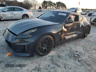 2009 Nissan 370Z z VIN JN1AZ44E19M401590, wystawiony jako Copart lot #81037614 z przebiegiem 94 977 mil mil oraz Szkoda całkowita • Salvage title. Historia ofert i sprzedaży dostępna na DreamBid. Obrazek 1.