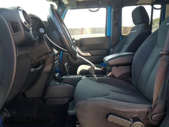 2015 Jeep Wrangler Unlimited Rubicon с VIN 1C4BJWFG9FL591529, выставлен на аукционе Copart как лот 58721265 с пробегом 110 373 миль миль и Чистый • Clean title. История ставок и продаж доступна на DreamBid. Изображение 7.