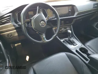 2019 Volkswagen Jetta SEL z VIN 3VWE57BU9KM041272, wystawiony jako Copart lot #56227985 z przebiegiem Nie podano mil oraz Szkoda całkowita • Salvage title. Historia ofert i sprzedaży dostępna na DreamBid. Obrazek 8.