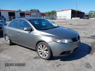 2010 Kia Forte SX with VIN KNAFW4A30A5312314, listed as a IAAI auction lot 41731007 with 169,466 mi miles. Bid and sale history available at carsss.com. Image 1.