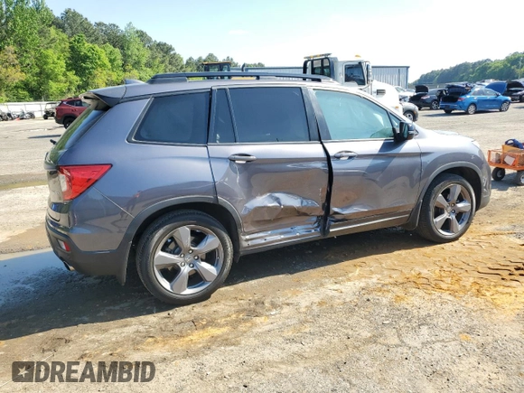 2021 Honda Passport Touring z VIN 5FNYF7H97MB011307, wystawiony jako Copart lot #52310415 z przebiegiem 72 118 mil mil oraz Szkoda całkowita • Salvage title. Historia ofert i sprzedaży dostępna na DreamBid. Obrazek 3.