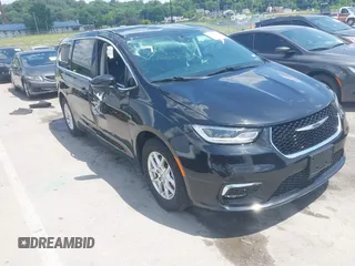 2023 Chrysler Pacifica Touring L with VIN 2C4RC1BG2PR591396, listed as a IAAI auction lot 42584848 with 67,403 mi miles and . Bid and sale history available at DreamBid. Image 1.