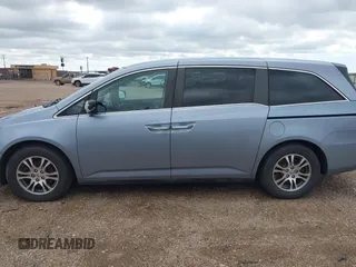 2011 Honda Odyssey EX-L with VIN 5FNRL5H64BB085479, listed as a IAAI auction lot 42404637 with 185,624 mi miles and . Bid and sale history available at DreamBid. Image 14.