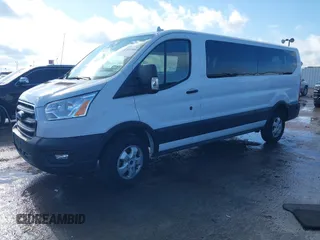 2020 Ford Transit Passenger XL with VIN 1FBAX2Y81LKA26321, listed as a IAAI auction lot 41110834 with Not provided miles and . Bid and sale history available at DreamBid. Image 17.