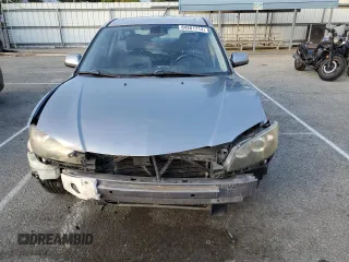 2006 Mazda 3 s with VIN JM1BK324761412942, listed as a Copart auction lot 84281714 with 198,645 mi miles and Salvage Title. Bid and sale history available at DreamBid. Image 5.