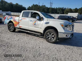 2019 Nissan Titan XD SL with VIN 1N6BA1F43KN511419, listed as a Copart auction lot 77875274 with 27,447 mi miles and Salvage Title. Bid and sale history available at carsss.com. Image 4.