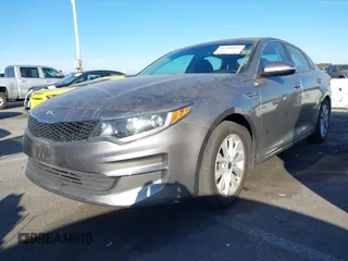 2018 Kia Optima LX with VIN 5XXGT4L32JG256921, listed as a IAAI auction lot 41389850 with 91,013 mi miles and . Bid and sale history available at DreamBid. Image 2.