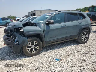 2015 Jeep Cherokee Trailhawk z VIN 1C4PJMBB6FW557664, wystawiony jako Copart lot #59496385 z przebiegiem 139 653 mil mil oraz Czysty tytuł • Clean title. Historia ofert i sprzedaży dostępna na DreamBid. Obrazek 1.