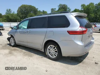 2015 Toyota Sienna XLE with VIN 5TDYK3DC9FS559460, listed as a Copart auction lot 59599405 with Not provided miles and Salvage title. Bid and sale history available at DreamBid. Image 2.