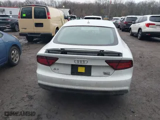 2017 Audi A7 Premium Plus with VIN WAUW2AFC0HN085266, listed as a IAAI auction lot 41461035 with 135,459 mi miles. Bid and sale history available at carsss.com. Image 16.