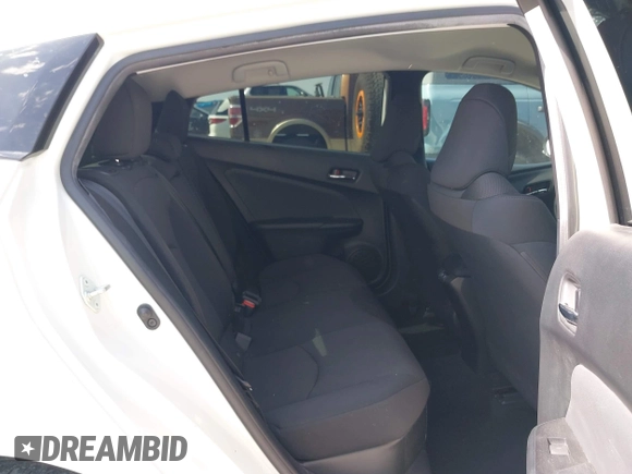2020 Toyota Prius L Eco z VIN JTDKARFU8L3126291, wystawiony jako IAAI lot #42190242 z przebiegiem 60 404 mil mil oraz . Historia ofert i sprzedaży dostępna na DreamBid. Obrazek 8.