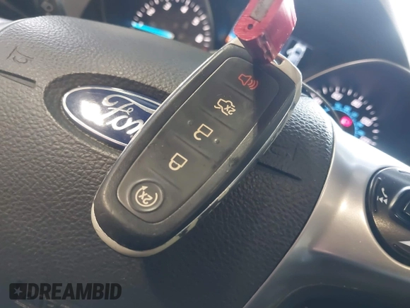 2015 Ford Escape Titanium with VIN 1FMCU9J98FUC70495, listed as a IAAI auction lot 41978543 with 129,974 mi miles. Bid and sale history available at carsss.com. Image 11.