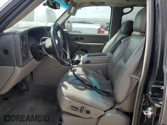 2005 Chevrolet Tahoe LT with VIN 1GNEK13T35R257272, listed as a Copart auction lot 61173025 with 145,933 mi miles and Salvage title. Bid and sale history available at DreamBid. Image 7.