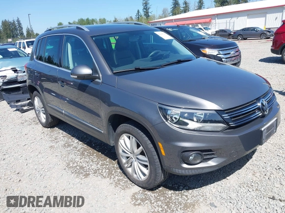 2013 Volkswagen Tiguan SEL with VIN WVGBV3AX1DW595673, listed as a IAAI auction lot 42140263 with 77,457 mi miles and . Bid and sale history available at DreamBid. Image 1.