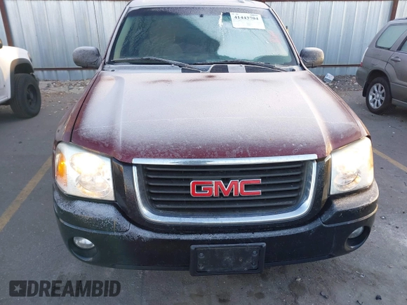 2005 GMC Envoy SLT with VIN 1GKDT13S452115924, listed as a IAAI auction lot 41443704 with 215,402 mi miles. Bid and sale history available at carsss.com. Image 6.