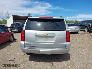 2020 Chevrolet Suburban Premier with VIN 1GNSCJKCXLR219679, listed as a IAAI auction lot 41806579 with 90,132 mi miles. Bid and sale history available at carsss.com. Image 16.