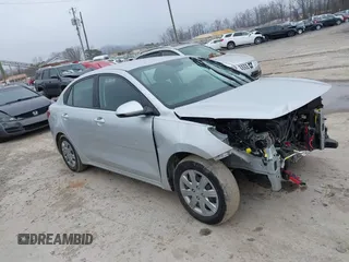 2021 Kia Rio LX with VIN 3KPA24AD9ME397339, listed as a IAAI auction lot 41591282 with 36,706 mi miles. Bid and sale history available at carsss.com. Image 1.