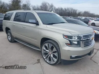 2015 Chevrolet Suburban LTZ with VIN 1GNSKKKC0FR525772, listed as a IAAI auction lot 41745084 with 187,981 mi miles. Bid and sale history available at carsss.com. Image 1.