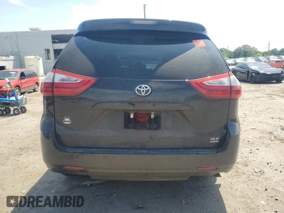2017 Toyota Sienna XLE with VIN 5TDDZ3DC6HS186360, listed as a Copart auction lot 57504965 with 99,026 mi miles and Salvage title. Bid and sale history available at DreamBid. Image 6.