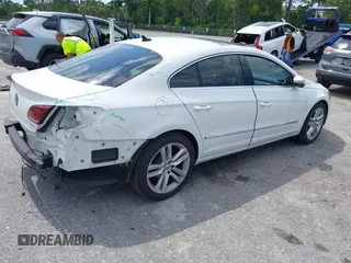 2014 Volkswagen CC Executive z VIN WVWRP7AN7EE537318, wystawiony jako IAAI lot #42308532 z przebiegiem 217 059 mil mil oraz . Historia ofert i sprzedaży dostępna na DreamBid. Obrazek 4.