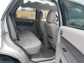 2011 Mercury Mariner Premier with VIN 4M2CN8H78BKJ01173, listed as a IAAI auction lot 40734817 with 67,784 mi miles. Bid and sale history available at carsss.com. Image 8.