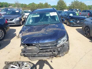 2015 Volkswagen Tiguan SE z VIN WVGBV7AX3FW583163, wystawiony jako IAAI lot #41991409 z przebiegiem 99 866 mil mil oraz . Historia ofert i sprzedaży dostępna na DreamBid. Obrazek 13.