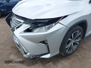 2017 Lexus RX 350 z VIN 2T2BZMCA9HC124727, wystawiony jako IAAI lot #42580173 z przebiegiem 106 749 mil mil oraz . Historia ofert i sprzedaży dostępna na DreamBid. Obrazek 6.