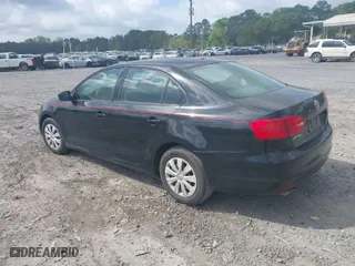 2013 Volkswagen Jetta Sedan S with VIN 3VW2K7AJ1DM256957, listed as a IAAI auction lot 41958682 with 189,095 mi miles. Bid and sale history available at carsss.com. Image 3.