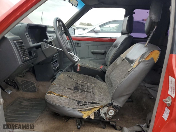 1989 Mazda B2200 Pickup 2WD with VIN JM2UF313XK0779271, listed as a Copart auction lot 80798524 with NaN miles and Salvage Title. Bid and sale history available at carsss.com. Image 7.