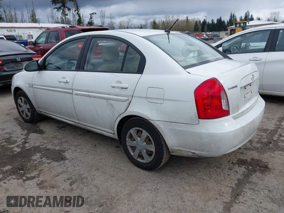 2007 Hyundai Accent GLS with VIN KMHCN46C67U097159, listed as a IAAI auction lot 41913373 with 103,303 mi miles. Bid and sale history available at carsss.com. Image 3.
