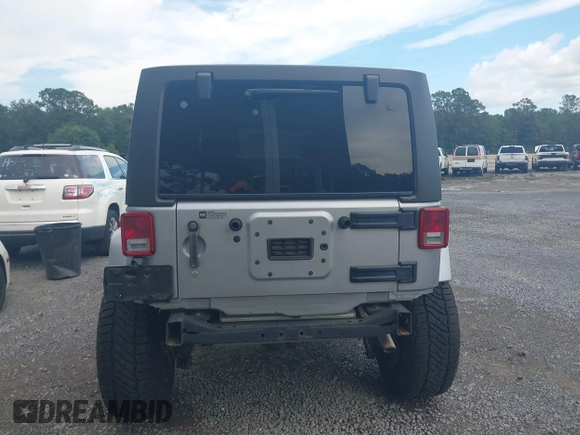 2016 Jeep Wrangler Unlimited Sahara with VIN 1C4BJWEG5GL117872, listed as a IAAI auction lot 42692798 with 119,819 mi miles and . Bid and sale history available at DreamBid. Image 16.