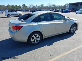 2014 Chevrolet Cruze 1LT with VIN 1G1PD5SBXE7300571, listed as a IAAI auction lot 41571549 with 71,981 mi miles. Bid and sale history available at carsss.com. Image 4.