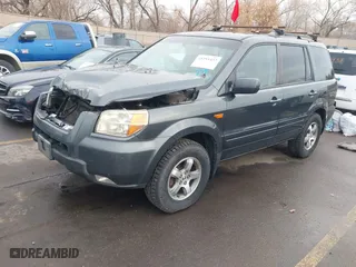 2006 Honda Pilot EX-L with VIN 2HKYF18526H563831, listed as a IAAI auction lot 41255427 with 237,074 mi miles. Bid and sale history available at carsss.com. Image 2.