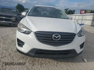 2016 Mazda CX-5 Sport with VIN JM3KE2BY0G0729349, listed as a Copart auction lot 62469735 with 88,247 mi miles and Salvage title. Bid and sale history available at DreamBid. Image 5.