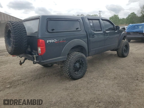 2012 Nissan Frontier Pro-4X with VIN 1N6AD0EVXCC415470, listed as a Copart auction lot 50650915 with 157,160 mi miles and Salvage title. Bid and sale history available at DreamBid. Image 3.