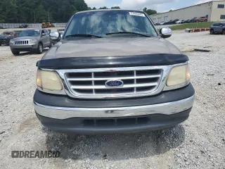 2001 Ford F-150 XLT z VIN 1FTRW07L81KF68346, wystawiony jako Copart lot #57460445 z przebiegiem Nie podano mil oraz Szkoda całkowita • Salvage title. Historia ofert i sprzedaży dostępna na DreamBid. Obrazek 5.