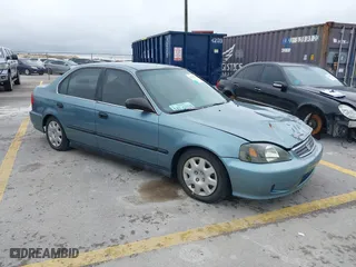 2000 Honda Civic LX with VIN 2HGEJ6571YH591699, listed as a IAAI auction lot 41799962 with 196,288 mi miles. Bid and sale history available at carsss.com. Image 1.