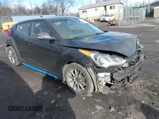 2015 Hyundai Veloster Turbo with VIN KMHTC6AE1FU239152, listed as a IAAI auction lot 41587593 with 169,649 mi miles. Bid and sale history available at carsss.com. Image 1.