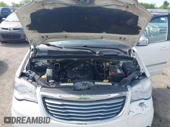 2012 Chrysler Town & Country Touring L with VIN 2C4RC1CG7CR156415, listed as a IAAI auction lot 42045371 with 233,306 mi miles and . Bid and sale history available at carsss.com. Image 10.