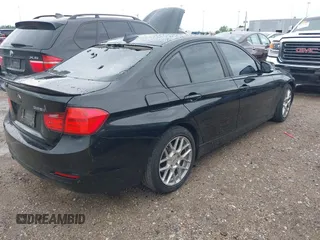 2015 BMW 3 Series 328i with VIN WBA3A5G50FNS91133, listed as a IAAI auction lot 41890141 with 119,495 mi miles. Bid and sale history available at carsss.com. Image 4.