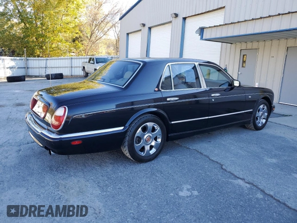 2001 Bentley Arnage with VIN SCBLC31E21CX05644, listed as a Copart auction lot 77706154 with 57,446 mi miles and Clean Title. Bid and sale history available at DreamBid. Image 3.