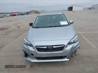 2018 Subaru Impreza Premium z VIN 4S3GKAD67J3604898, wystawiony jako IAAI lot #41694176 z przebiegiem 97 287 mil mil oraz . Historia ofert i sprzedaży dostępna na DreamBid. Obrazek 6.