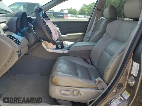 2007 Acura RDX with VIN 5J8TB18277A024451, listed as a Copart auction lot 56799175 with 192,186 mi miles and Salvage title. Bid and sale history available at DreamBid. Image 7.