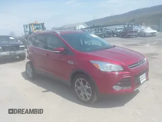 2015 Ford Escape Titanium with VIN 1FMCU9JX9FUB87463, listed as a IAAI auction lot 42059618 with 32,100 mi miles. Bid and sale history available at carsss.com. Image 1.